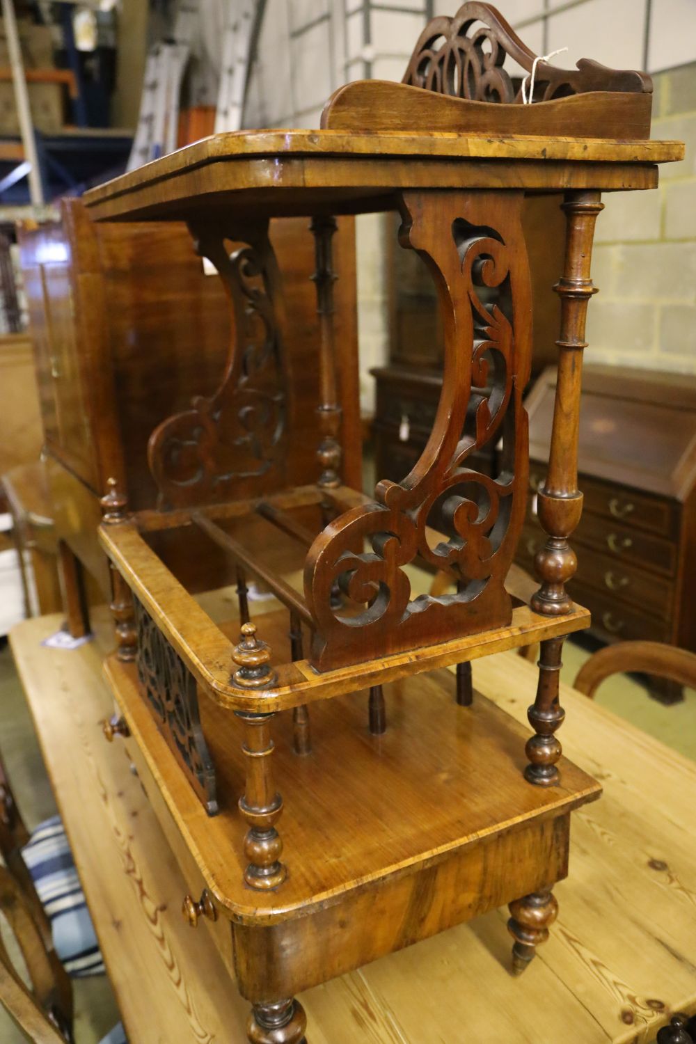 A Victorian burr walnut music Canterbury-cum-whatnot, fitted drawer to base, width 60cm depth 40cm height 105cm